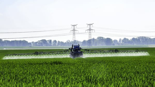 Pesticides are sprayed on a field of cereals in northern France