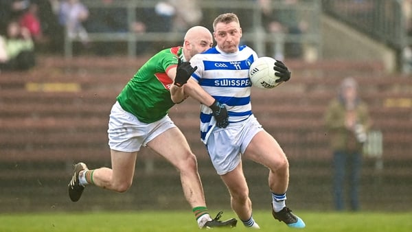 Brian Hurley (R) of Castlehaven in action against Conor Walsh of Rathgormack